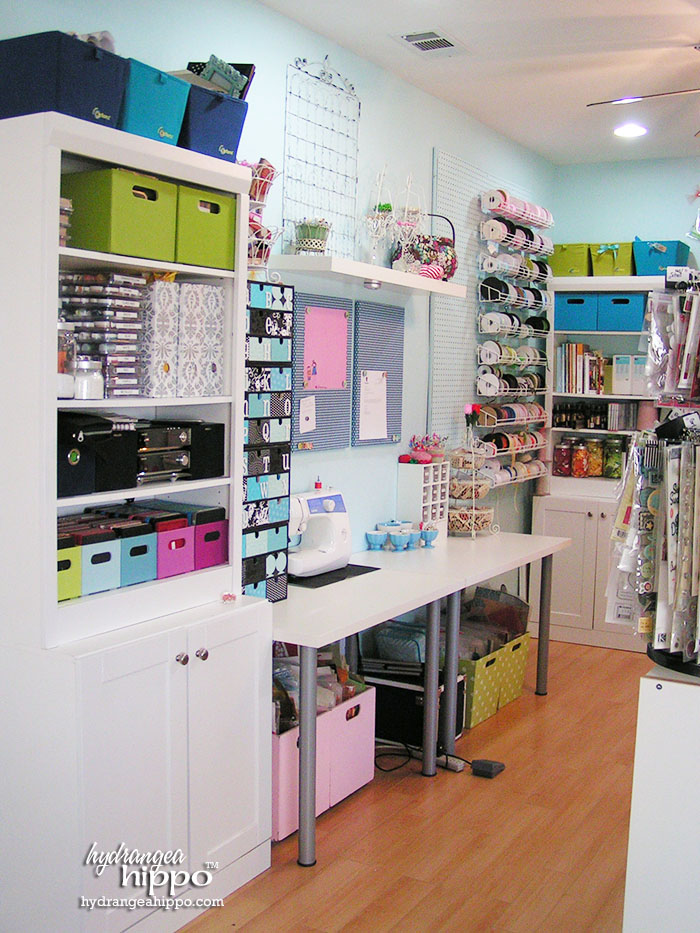 Die cut center, sewing area, storage, and ribbon wall in Jennifer Priest's Scrapbook Room.
