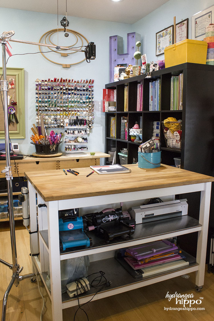 Craft Room Tour 2015 - Smart Fun DIY. Keep larger tools on tables at the ready. Store tools you use less often on shelving, like the serger sewing machine on the bottom shelf of a work table in this photo