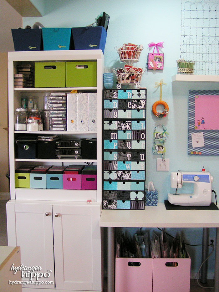 Die cut center, sewing area, storage, and Ikea FIRA boxes in Jennifer Priest's Scrapbook Room.