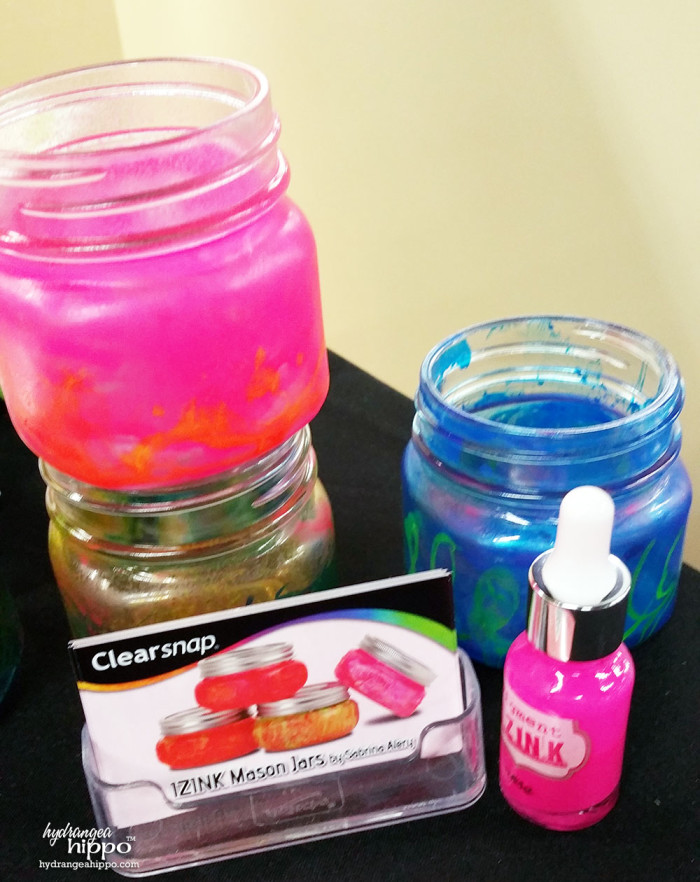 Izink was used in the Clearsnap booth to color glass Mason jars.