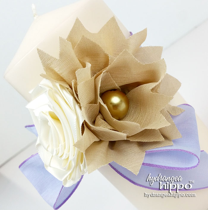 Create these ribbon flowers with Offray's gorgeous ribbons. I cut a zig zag pattern in the ribbon the create the pointed petals on this flower.